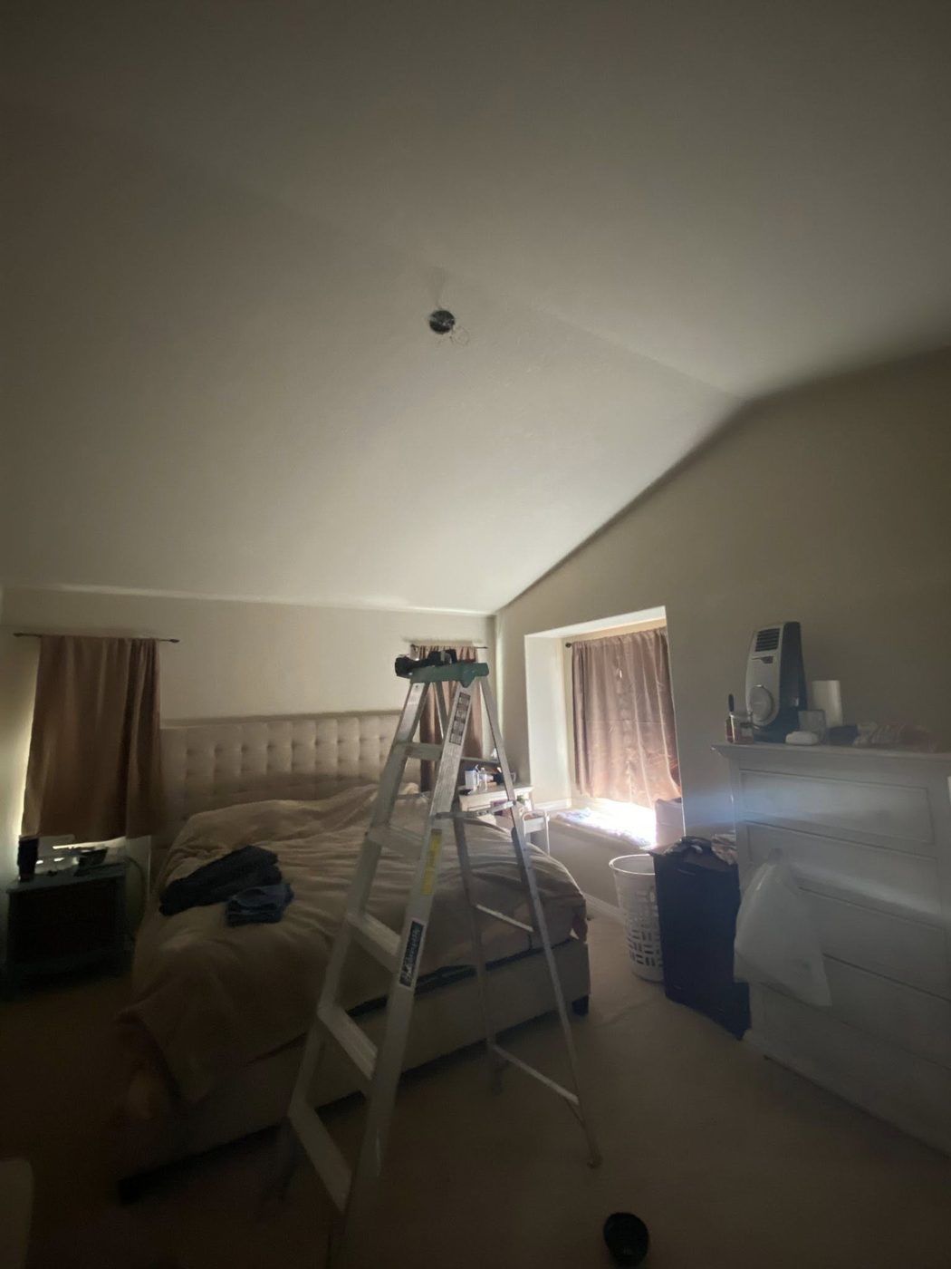 Bedroom with ceiling fan removed